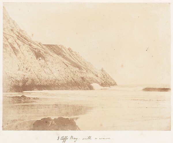 3 cliffs bay with a wave