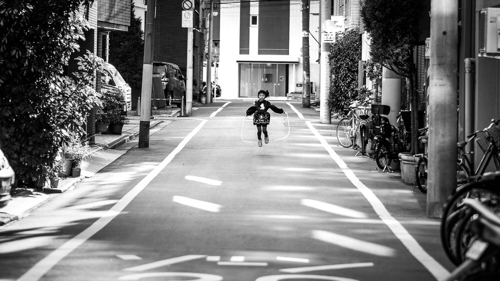 happiness - tokyo, japan - black and white street photography