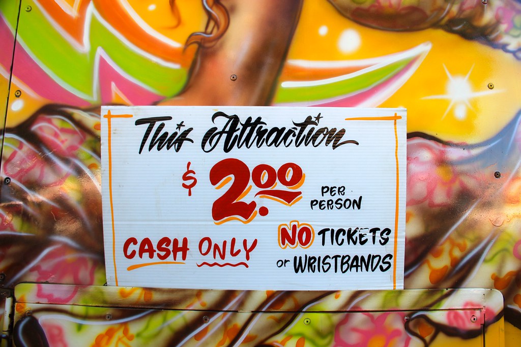 hand-painted sign: this attraction $2.00 per person, cash only, no tickets or wristbands