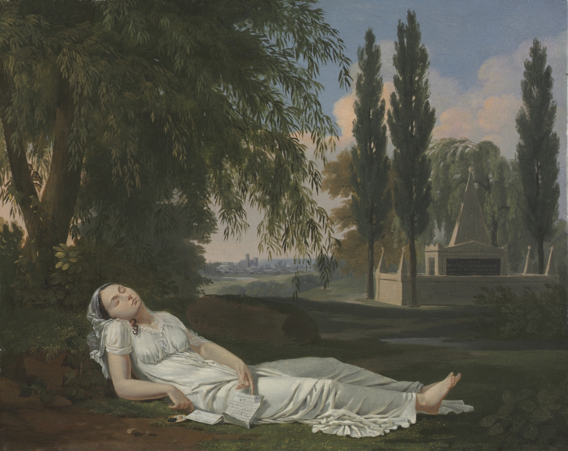 woman sleeping in a landscape with a letter