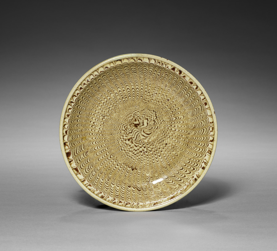 flat dish made of marbled clay