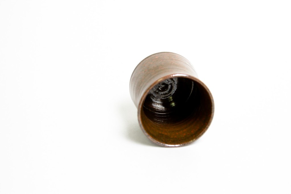 australian studio pottery cup with incised s on back